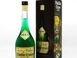 a bottle of alcohol that is sitting next to a box