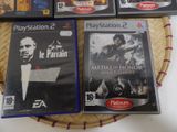 a lot of video games sitting on a table