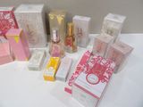 a lot of different types of perfumes on the table