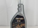 a bottle of spray on a table with a white background
