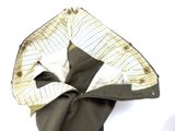 a close up of a jacket with a tie on it