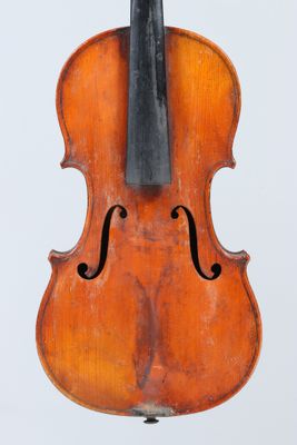 an old violin with a bow on a white background