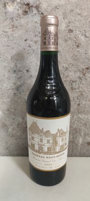 a bottle of wine that is sitting on a table