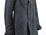 an image of a black coat with fur on it