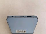a close up of the back of a cell phone on a table
