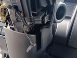 an image of a car dashboard with a bunch of items in it