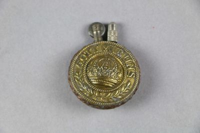 an image of a gold medal with a crown on it