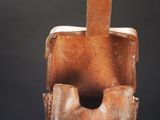 a piece of metal that has been made to look like a horse ' s back