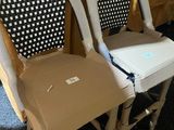 two chairs that are sitting next to each other