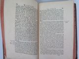 an open book with a red border on it