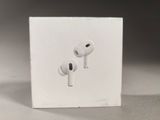 a white box with a pair of airpods on it