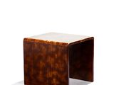 the side table is made of wood and has a marble top