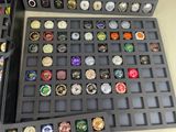a lot of bottle caps that are on the table