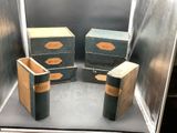 three boxes that are sitting inside of a glass case
