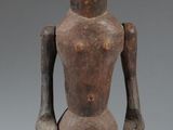 an image of a statue of a man standing on a black base