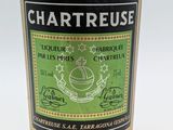 a bottle of wine that is sitting on a table