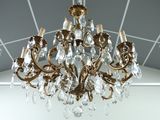 a chandelier that has a lot of crystal hanging from it