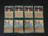 six cartes sur lesquelles figure une croix, posées sur une table