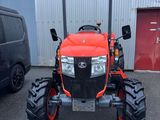 an image of a red tractor parked in front of a building