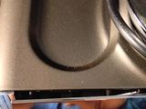 a black stove top with a black burner and a black stove top