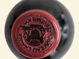 a close up of a bottle of wine with a label on it