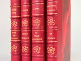 a set of five red books sitting on top of each other