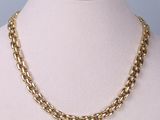a gold chain necklace on a mannequin mannequin mannequin mannequin mannequin mannequin mannequin mannequin manne