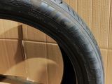 tire of a motorcycle on a cardboard box in front of a cardboard box