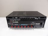 a close up of the back of a stereo amplifier