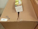 two boxes of food on a pallet next to each other