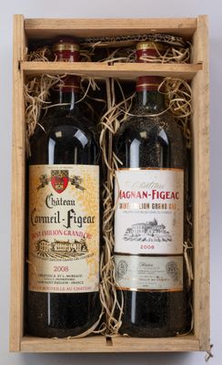 deux bouteilles de vin dans un coffret en bois sur une surface blanche
