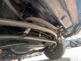 a close up view of a car ' s exhaust pipe and exhaust pipe