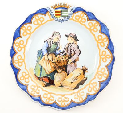 a plate with a picture of a man and a woman on it