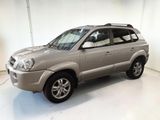 a picture of a silver suv parked in a white room