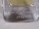a bottle of perfume that is sitting on a table