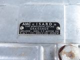 a close up of a metal sign on a machine