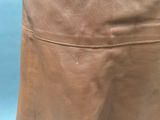 brown leather skirt with zippers and pockets on a mannequin mannequin mannequin mannequin mannequin mannequin mannequin mann
