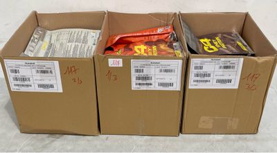 three boxes of snacks are stacked on top of each other