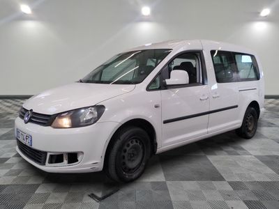 a picture of a white van parked on a checkered floor