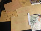 many envelopes that have been placed on a table