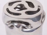 a silver container that has a design on it