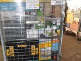 a metal cart with many items in it in a warehouse