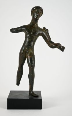 an image of a bronze statue of a boy holding a ball