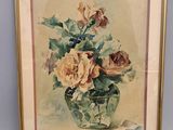 painting of flowers in a vase on a table next to a wall