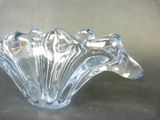 a glass bowl that is sitting on a table