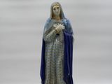 figurine of the virgin of guadalupe in blue and gold