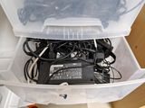 a plastic container filled with a lot of wires