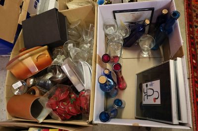 a box full of items that are sitting on the floor