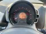a close up of a car dashboard with a speedometer