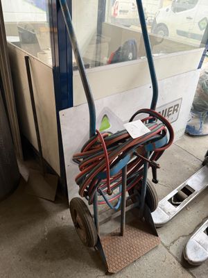 a cart with a bunch of wires attached to it